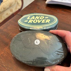 Two novelty Land Rover t-shirts in shrink wrap - one L and one M (short sleeve)